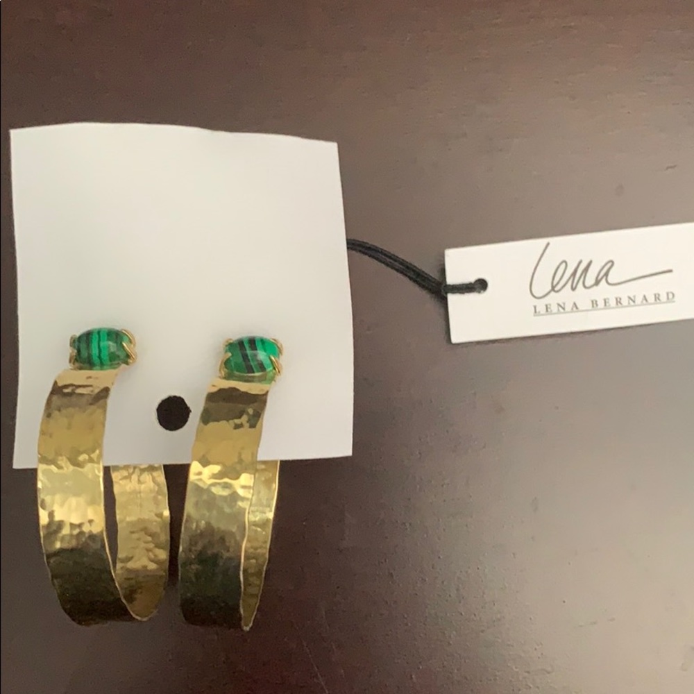 Free People earrings with green and black stones.